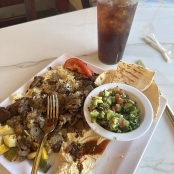 Tut's Egyptian Cuisine - This is halfway through eating a single gyro plate. It's so good I had to stop to leave this review. - Mediterranean Near Me - Los Angeles, California Tut's Egyptian Cuisine - This is halfway through eating a single gyro plate. It's so good I had to stop to leave this review. - Mediterranean Near Me - Los Angeles, California