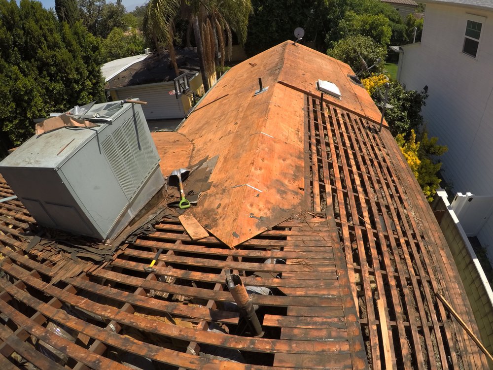 Slide of Mega Roofing