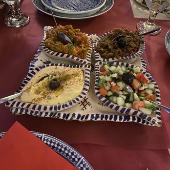 Arrayanes - Plato de Degustación (Tasting Platter for Two, €15), clockwise from top left: Roasted Vegetables, Baba Ghanoush, Cucumber Salad, Hummus - Middle Eastern Near Me - Granada, GR
