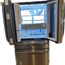 Lowe's Home Improvement - This was the way the 1st fridge was left by Sprint. Notice the handles with the screws facing up instead of down on the lower doors