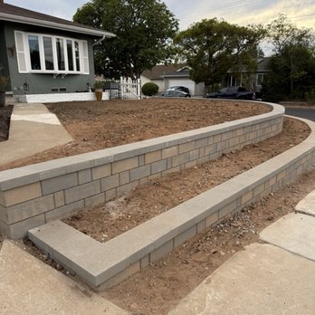 Domingo Landscaping - Staggered retaining wall - Tree Services Near Me