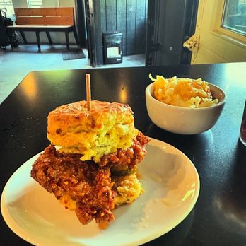 Bomb Biscuit - Hot honey chicken on cheddar jalapeño biscuit, hash brown casserole - Breakfast & Brunch Near Me - Atlanta, Georgia