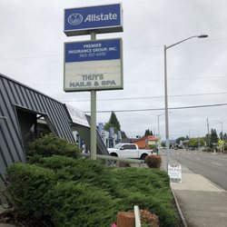 Thuy's Nail & Spa - View from the side (Allstate parking lot) and sidewalk sign