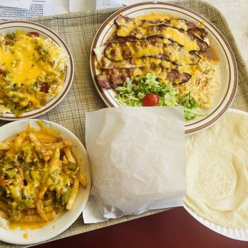 Frontier - Left to right. Western hash browns, frontier burrito with double bacon. Green chile cheese fries a double cheeseburger and a tortilla! - Mexican Near Me - Albuquerque, New Mexico