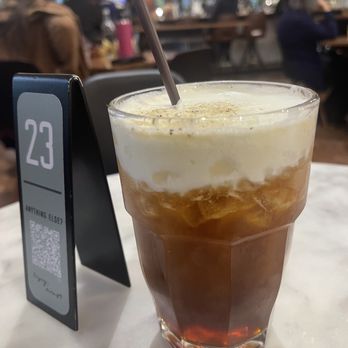 Mr West Cafe Bar Downtown - A large cardamom rose cold brew at the very cool Mr West - Bars Near Me - Seattle, Washington Mr West Cafe Bar Downtown - A large cardamom rose cold brew at the very cool Mr West - Bars Near Me - Seattle, Washington