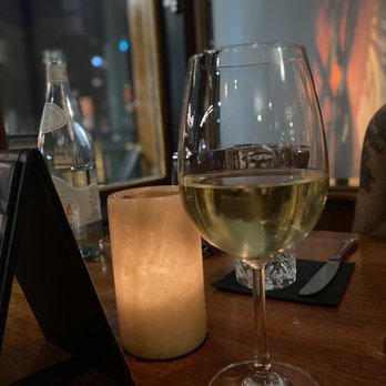 456 Fish - a glass of wine on a table - Seafood Near Me - Norfolk, Virginia