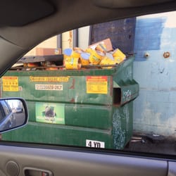 Rita's Whole Sale And Speclity Foods - Cans of tomato salsa behind ritas wholesale.