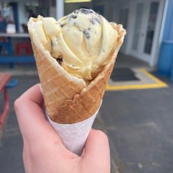 The Flagpole - My cookies and cream single scoop on a waffle cone