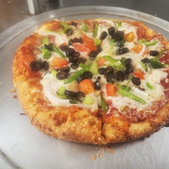 Hometown Eatery - a pizza with vegetables and cheese - Breakfast & Brunch Near Me - North Rose, New York Hometown Eatery - a pizza with vegetables and cheese - Breakfast & Brunch Near Me - North Rose, New York