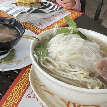Pho Ha Noi - Regular size rare steak pho with a $5 side of tendon that contains only 4 pieces of those. - Vietnamese Near Me - Irvine, California