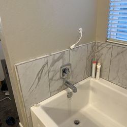 Jojo's Handyman Services - Customer wanted tv over tub