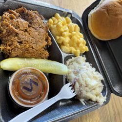 Pulled pork sandwich with sides
