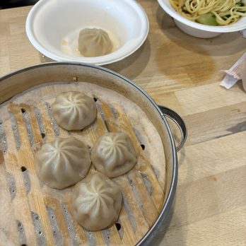 Early Bird Cafe - Steamed soup dumplings I only got one because my child who is very picky ate them all! - Dim Sum Near Me - Kirkland, Washington