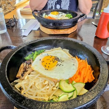 Cozy Kimchi - We both got Bibim Bap, one with chicken, one shrimp. Its so sizzling came out quick and perfect - Korean Near Me - Newburyport, Massachusetts