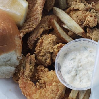 Cluck's Chicken - Number 8! 2 fish, 4 shrimp, 4 oysters, 2 hushpuppies (ate my fries lol) and a roll - Chicken Wings Near Me - Los Angeles, California