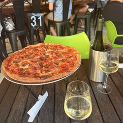 Mezzo Market - Meat pizza and a bottle of Pinot grig
