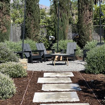 Union Landscape - Fireplace area with concrete steppers and native plants - Landscaping Near Me