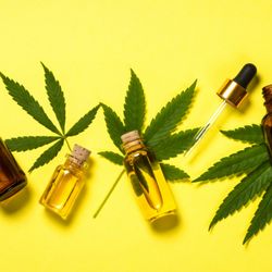 MJ MD Clinic - Cannabis leaves with oils