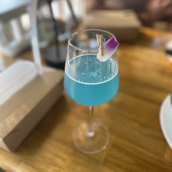 Madi - Blue Dream Mimosa (made with blue-green spirulina) - Breakfast & Brunch Near Me - San Diego, California Madi - Blue Dream Mimosa (made with blue-green spirulina) - Breakfast & Brunch Near Me - San Diego, California