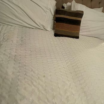 Grand Pine Cabins - Dirty Stained bed sheet - Hotels Near Me - Wrightwood, California