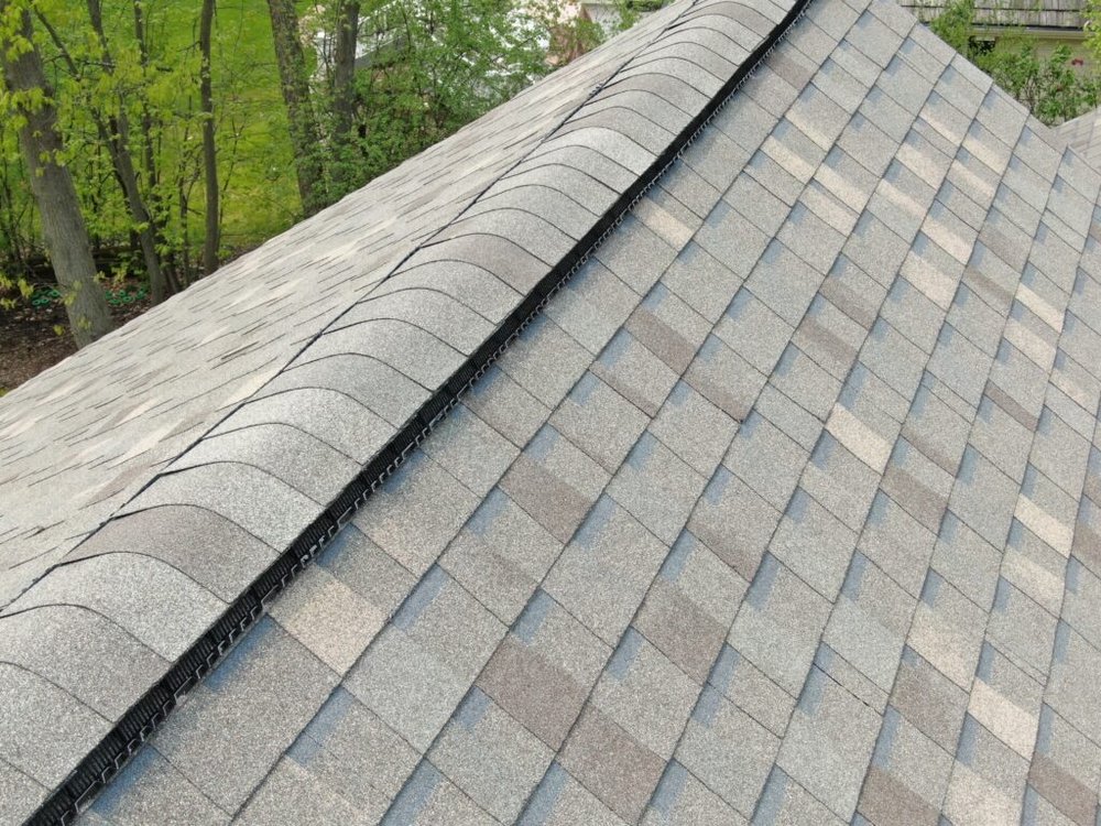Slide of Golden Line Roofing