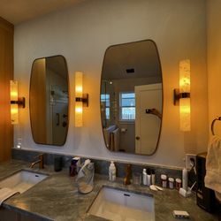 Prestige Home Repair - After I installed wall sconces, mirrors, and towel bar.