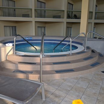 DoubleTree by Hilton Hotel Holland - A nice Whirlpool on the other end of the half moon pool - Hotels Near Me - Holland, Michigan DoubleTree by Hilton Hotel Holland - A nice Whirlpool on the other end of the half moon pool - Hotels Near Me - Holland, Michigan