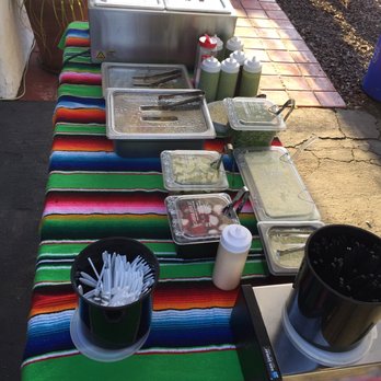 Tacos El Gabacho - Delish condiments! Rice and beans are served piping hot from a steam tray. Festive table set up. Look how neat this is!!! - Caterers Near Me Tacos El Gabacho - Delish condiments! Rice and beans are served piping hot from a steam tray. Festive table set up. Look how neat this is!!! - Caterers Near Me