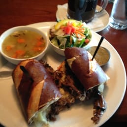 Beef dip on pretzel bun