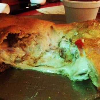 Rizzotto's Pizzeria - Steak Calzone - Italian Near Me - Largo, Florida Rizzotto's Pizzeria - Steak Calzone - Italian Near Me - Largo, Florida