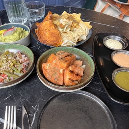 a variety of mexican food on a table a variety of mexican food on a table