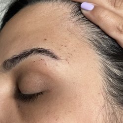 Art of Browz Austin Eyebrow Threading - Red spots around my eyebrows is skin she removed while threading. I requested full face and you can see hairs in my face! Dont go here!