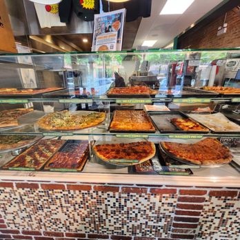 Prince Street Pizza - Pizza choices in front display - Pizza Near Me - Chicago, Illinois Prince Street Pizza - Pizza choices in front display - Pizza Near Me - Chicago, Illinois