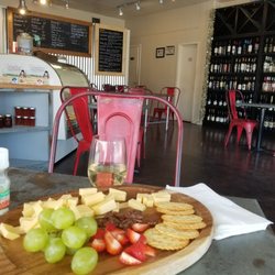 Bodega Wine Market - A picture of my weekly cheese board! Fruit, nuts, smoked gouda cheese crackers and more. Enough to snack on for several people