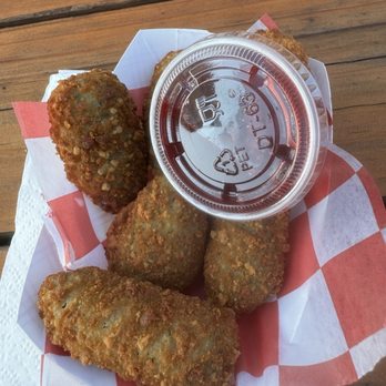 Valentino's - Poppers with raspberry sauce. - Burgers Near Me - Grants Pass, Oregon