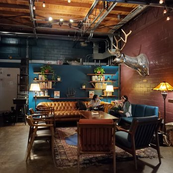 Lazarus Brewing - Living room with disco ball deerhead! - Breweries Near Me - Austin, Texas Lazarus Brewing - Living room with disco ball deerhead! - Breweries Near Me - Austin, Texas