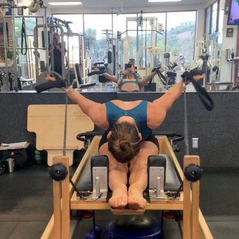 Empower Pilates - Rowing Series on the Pilates Reformer - Trainers Near Me