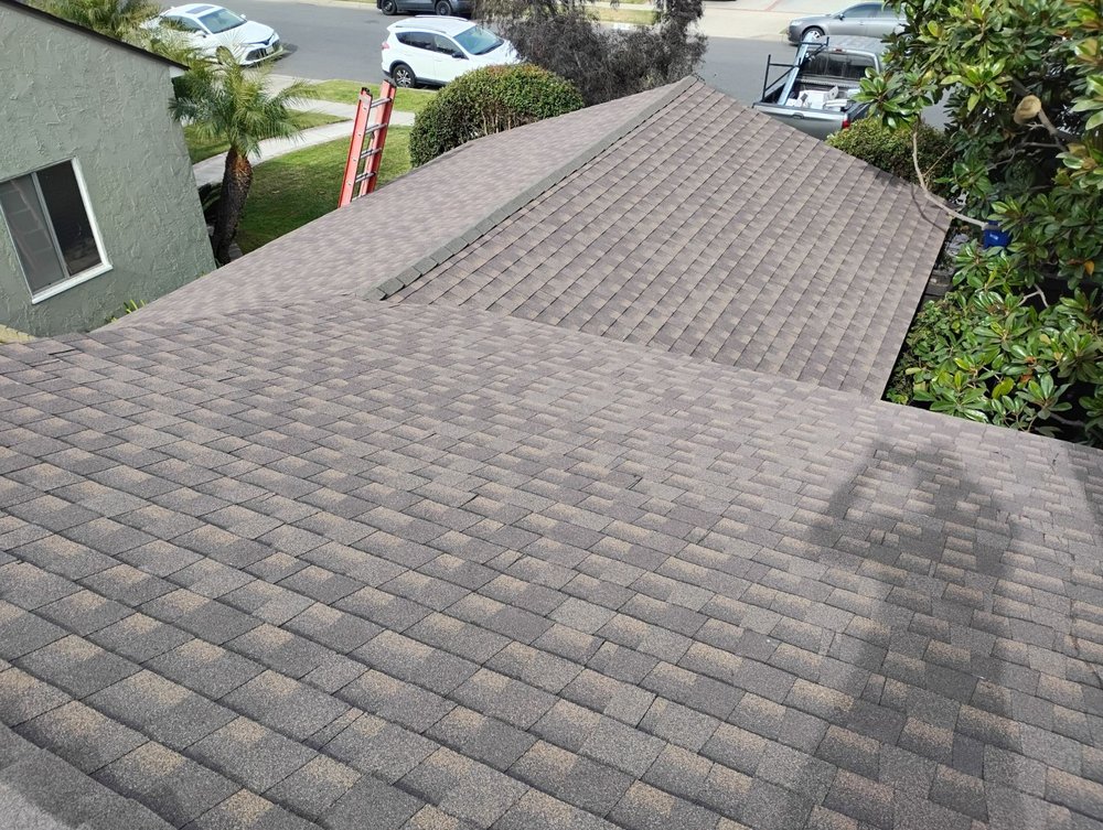 Slide of Sam's Roofing Co