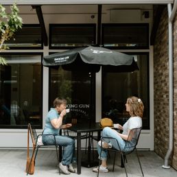 Exterior outside entrance of Smoking Gun Coffee Roasters - Covered outdoor seating - Chilliwack, British Columbia Exterior outside entrance of Smoking Gun Coffee Roasters - Covered outdoor seating - Chilliwack, British Columbia