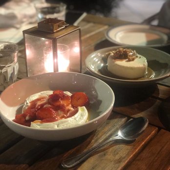 Saba - Bay Leaf Pavlova in the front, Labneh Cheesecake in the back - Mediterranean Near Me - New Orleans, Louisiana Saba - Bay Leaf Pavlova in the front, Labneh Cheesecake in the back - Mediterranean Near Me - New Orleans, Louisiana