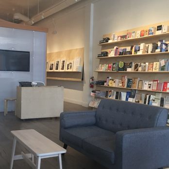 Contra Coffee & Tea - Couch near book shelf to read - Coffee & Tea Near Me - Orange, California