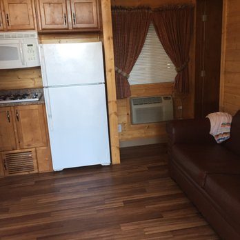 Yellowstone Park / Mountainside KOA - Kitchen/ living space ( pullout sofa) - RV Parks Near Me - West Yellowstone, Montana Yellowstone Park / Mountainside KOA - Kitchen/ living space ( pullout sofa) - RV Parks Near Me - West Yellowstone, Montana