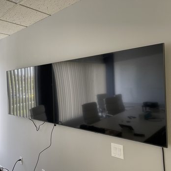 Irvine Hanging - Two tvs in office conference room perfectly aligned - Handyman Near Me Irvine Hanging - Two tvs in office conference room perfectly aligned - Handyman Near Me