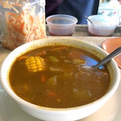 Rinconcito Latino - Mondongo - tripe and beef soup with carrots, celery, corn, yucca!