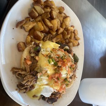 Wayfinder - Carnitas eggs benedict and roasted potatoes - American Near Me - Estes Park, Colorado Wayfinder - Carnitas eggs benedict and roasted potatoes - American Near Me - Estes Park, Colorado