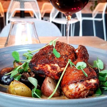 Brenner Pass - a plate of food and a glass of wine - Modern European Near Me - Richmond, Virginia