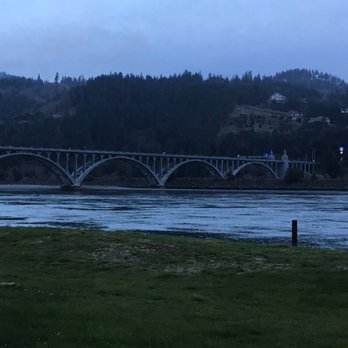 Jot's Resort - Conde McCullough bridge over the Rogue River before it flows to the ocean. - Resorts Near Me - Gold Beach, Oregon