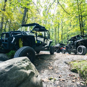 RideOn UTV Rentals - Three Polaris RZR UTVs from the RideOn Rentals fleet parked along the scenic river on Greenbrier Road near Gatlinburg. - ATV Rentals/Tours Near Me - Gatlinburg, Tennessee RideOn UTV Rentals - Three Polaris RZR UTVs from the RideOn Rentals fleet parked along the scenic river on Greenbrier Road near Gatlinburg. - ATV Rentals/Tours Near Me - Gatlinburg, Tennessee