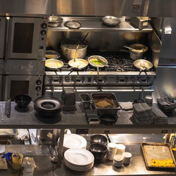 Webb Custom Kitchen - A view of the kitchen from the 2nd balcony.  Photo by @mtoddphotography - New American Near Me - Gastonia, North Carolina