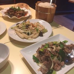Beef offal with chili sauce , squid and veggies, lamb with cumin